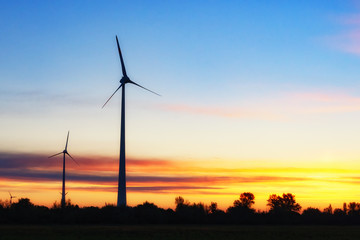 Fototapeta na wymiar Renewable energy with wind turbines