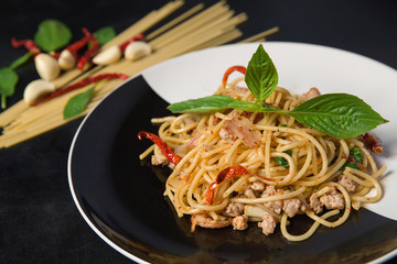 Fusion Food between italian and Thai is Spaghetti  with spicy pork