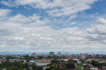 white cloud on blue sky above the town, aerial view cityscape