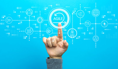 Agile concept with hand on a blue background