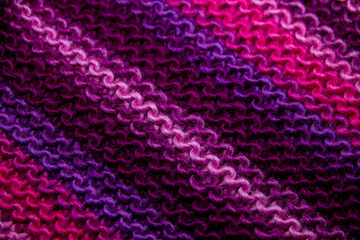 Pink, white and violet striped knitted texture background