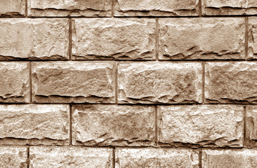 Decorative brick wall in brown color.