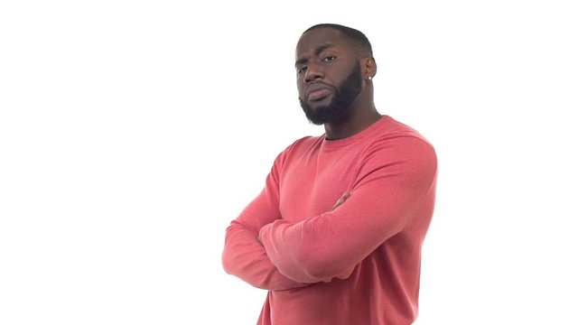 Slow motion arrogant handsome bearded black man cross arms chest, looking judgemental, making opinion, looking unimpressed, changing emotion approval, good choice, reacting doubtful disbelief