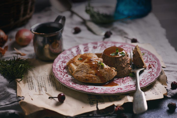 Chicken liver flan with chicken breast and demiglas sauce.selective focus