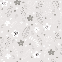 Vector floral pattern in doodle style with flowers and leaves.