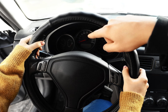 Young woman passing driving license test