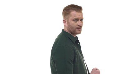 Slow motion redhead bearded masculine serious man turning camera shaking head saying no displeased, forbid, disagree expressing disapproval, strong prohibition, negative response, white background