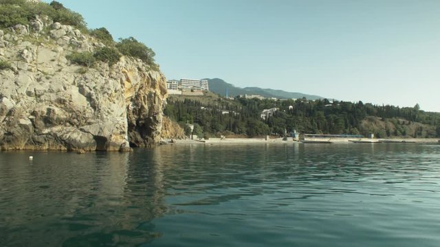 Aerial footage Beautiful rocky shore with a rock