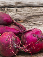 Fresh organic beet, beetroot. Young beets on wooden table. Fresh beet on wooden background.