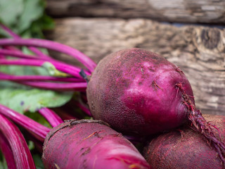 Fresh organic beet, beetroot. Young beets on wooden table. Fresh beet on wooden background.