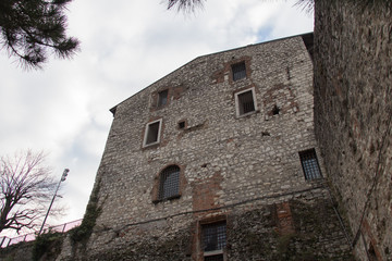 A wall of Luigi Marzoli weapon museum in the Brescia Castle, Lombardy, Italy.