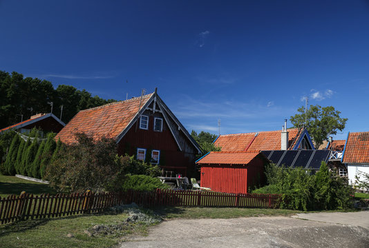 Preila, Lithuania - August 15, 2018: Traditional curonian spit fishermen houses near curonian lagoon.