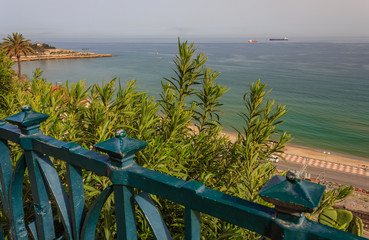 the Balcony on the Mediterranean with a view of the bay of Tarragona, Spain .For the tarragonesi it is almost an obligation go and touch the iron of the balustrade of the balcony of the Mediterranean
