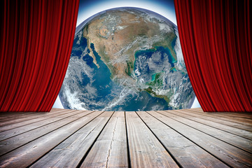 Open theater red curtains against our wonderful Planet Earth - concept image with image from NASA