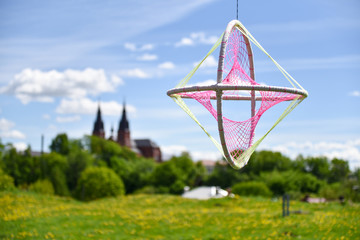 A Dream catcher hanging with beautiful background.