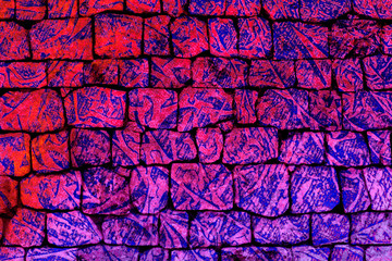 pink purple abstract graffiti texture on stone wall