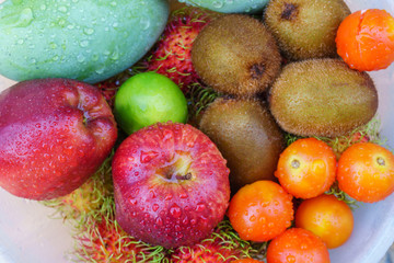 Mixed of tropical fruits close up, healthy concept.