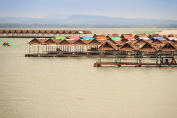 Jet skies and water activities including floating food shop at Pattaya Noi beach in Sirindhorn Dam, Ubon Ratchathani, Thailand.