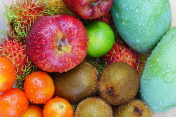Mixed of tropical fruits close up, healthy concept.