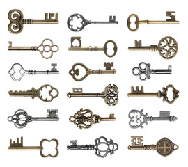 Set of vintage ornate keys on white background