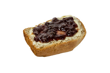 slice of white bread with butter and strawberry jam isolated