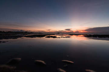 Fototapeta na wymiar beautiful sunset on the beach called 