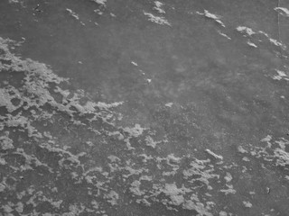 Snow on the ice of the river. Frozen river. Ice on the river.