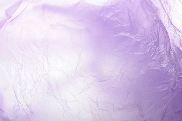 Purple gradient plastic garbage bag material as a background