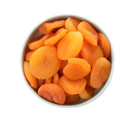 Bowl with apricots on white background, top view. Dried fruit as healthy food