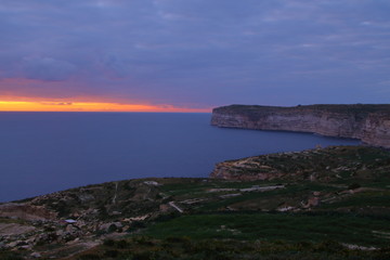 After sunset on the cliffs in Malta.Sanap cliffs on Gozo island.