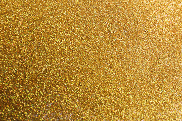 Closeup view of sparkling golden glitter background