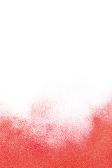 Red glitter on white background, top view