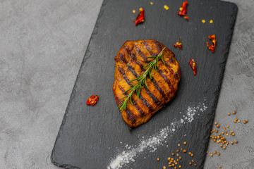 Rosemary steak on gray background