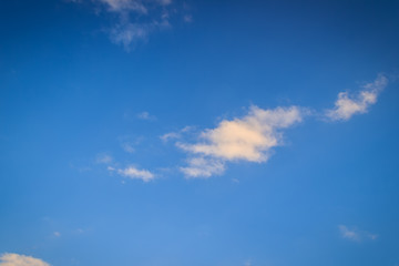 Blue sky with white clouds in the afternoon. The vast blue sky and unusual shapes clouds on sky at afternoon time.