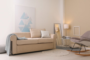 Modern living room interior with comfortable sofa