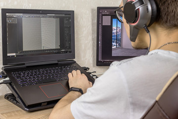 3D modeling on the computer. Man develops graphic design