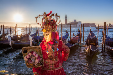Colorful carnival mask at a traditional festival in Venice, Italy