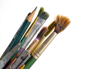 Old used paintbrushes.Used dirty paint brushes on white background