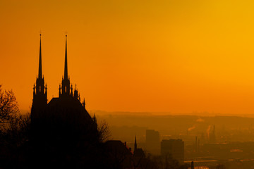 View of old city in fog at sunrise. City of Brno czech republic - Cathedral of St. Peter and Paul.