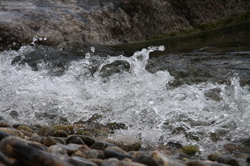 water flowing over rocks