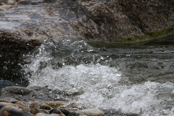 water flowing over rocks