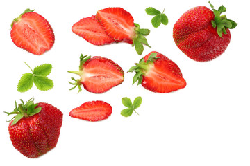 Strawberry with green leaf and slices isolated on white background. Healthy food. top view