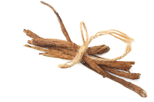 licorice roots isolated on white background