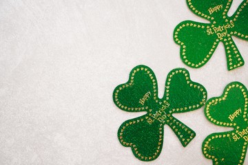 St Patrick's day background with shamrock and clover leaves