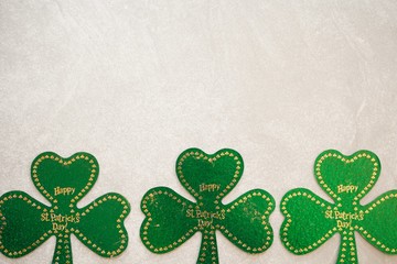 St Patrick's day background with shamrock and clover leaves