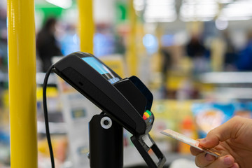 payment for purchases at the checkout at the supermarket