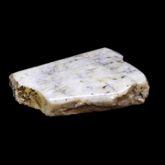 Natural piece of belomorite on black background