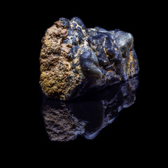 Natural agate black and white druze closeup on a black background