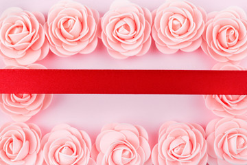 decorative pink roses in the shape of a frame with a red ribbon on top, mockup