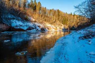 frozen forest river in winter